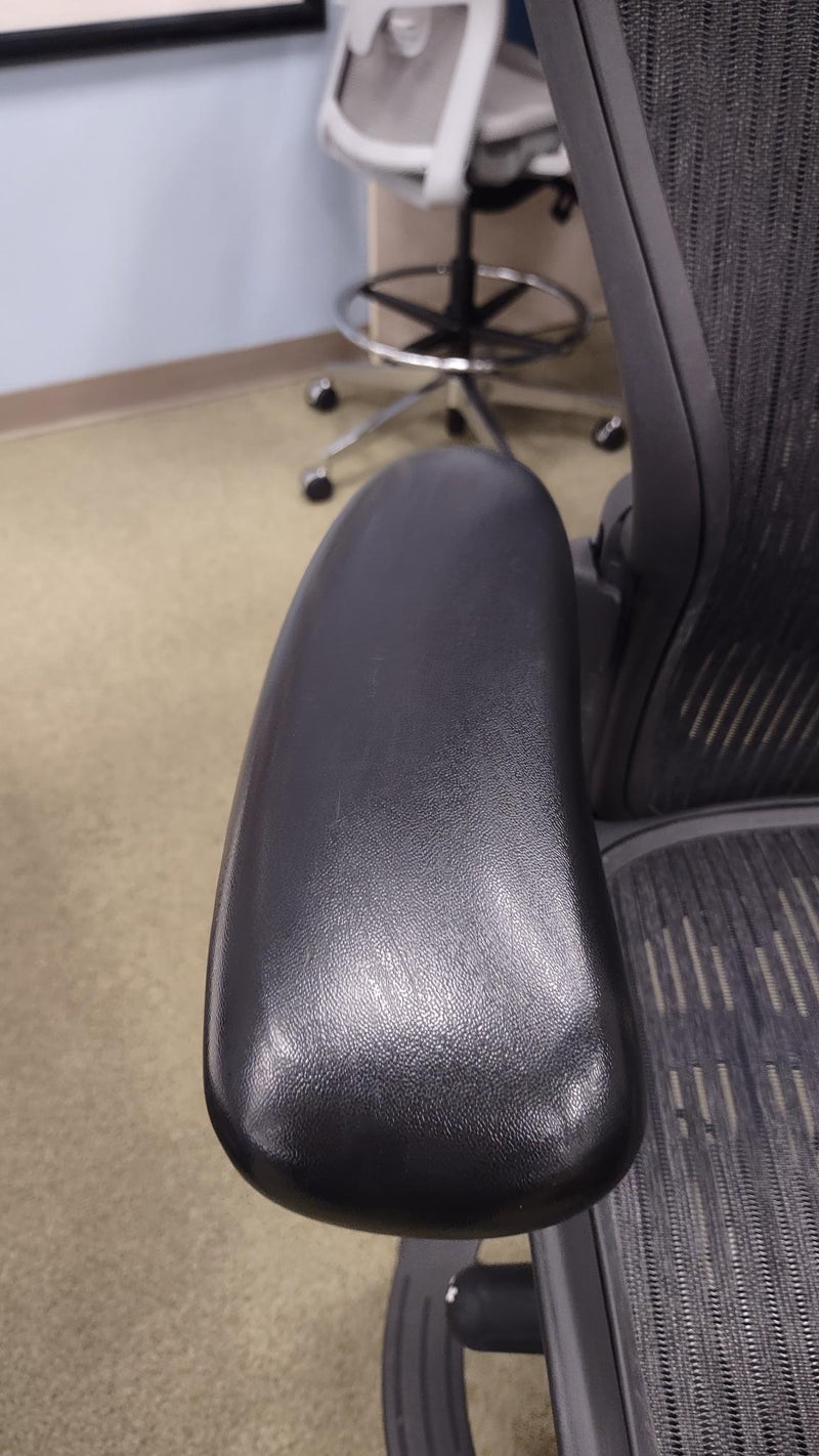 USED Herman Miller Aeron Black Stool Chair - close up view of arm rest