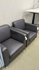 USED Club Chair with Steel Base and Black Vinyl Finish