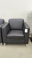 USED Club Chair with Steel Base and Black Vinyl Finish