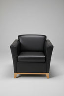 USED Club Chair with Wood Legs – Black Vinyl