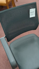 USED Guest chair with leather seat, fixes arms, and casters